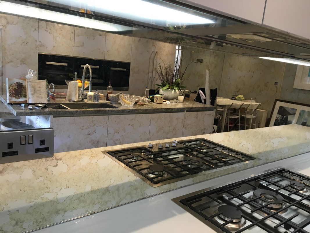 Mirror glass splashback in Gerrards Cross luxury kitchen